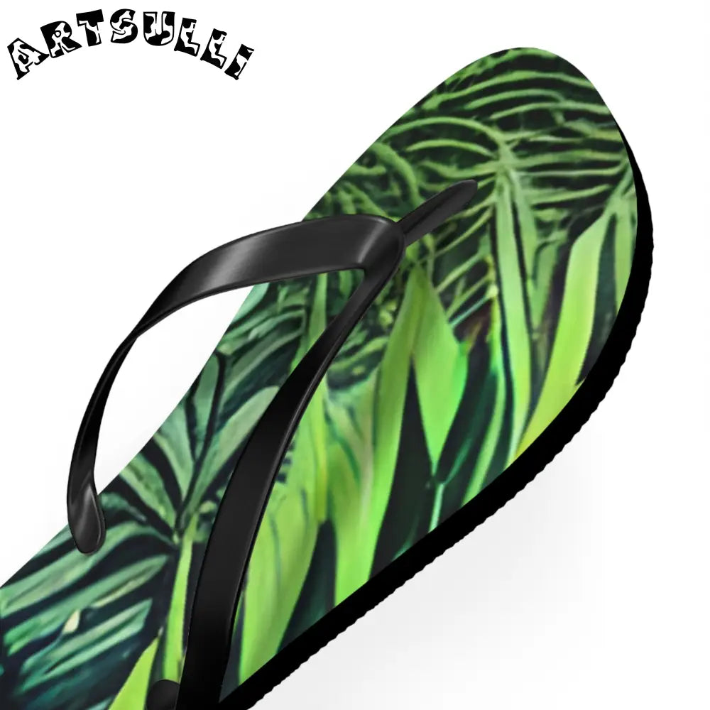 JAKKOUTTHEBXX Black Strapped Flip Flops with Green Leaf Pattern