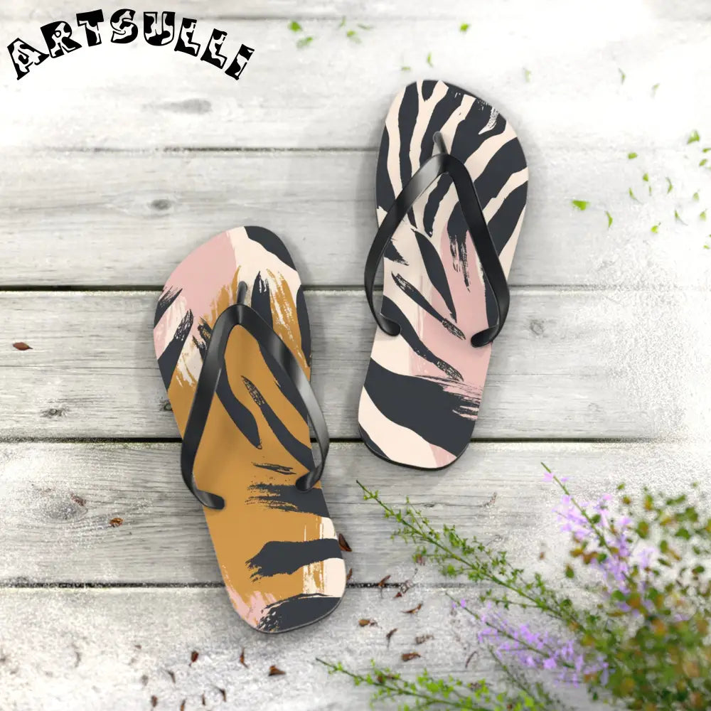 JAKKOUTTHEBXX Abstract zebra print flip flops in two color palettes