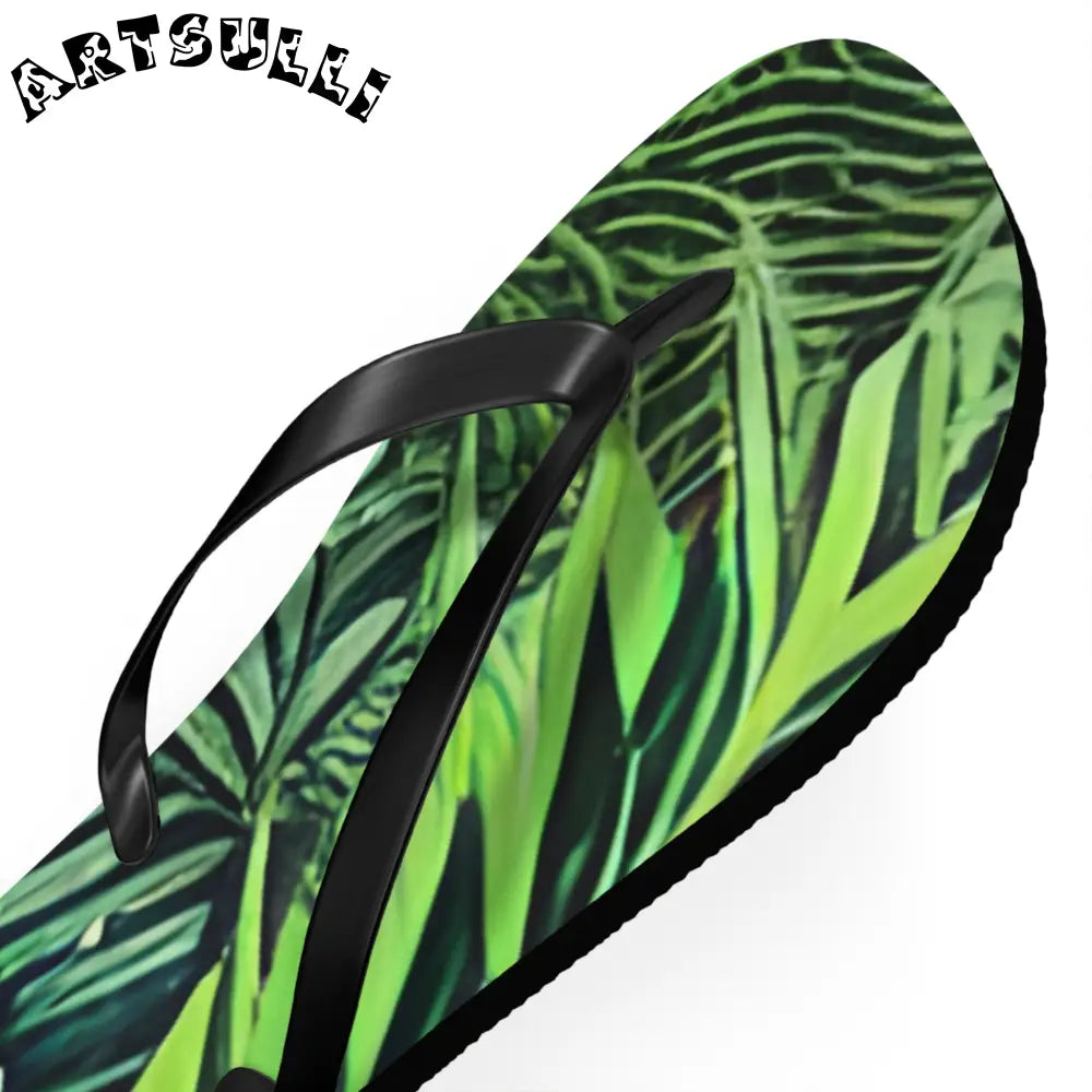 JAKKOUTTHEBXX Black Strapped Flip Flops with Green Leaf Pattern