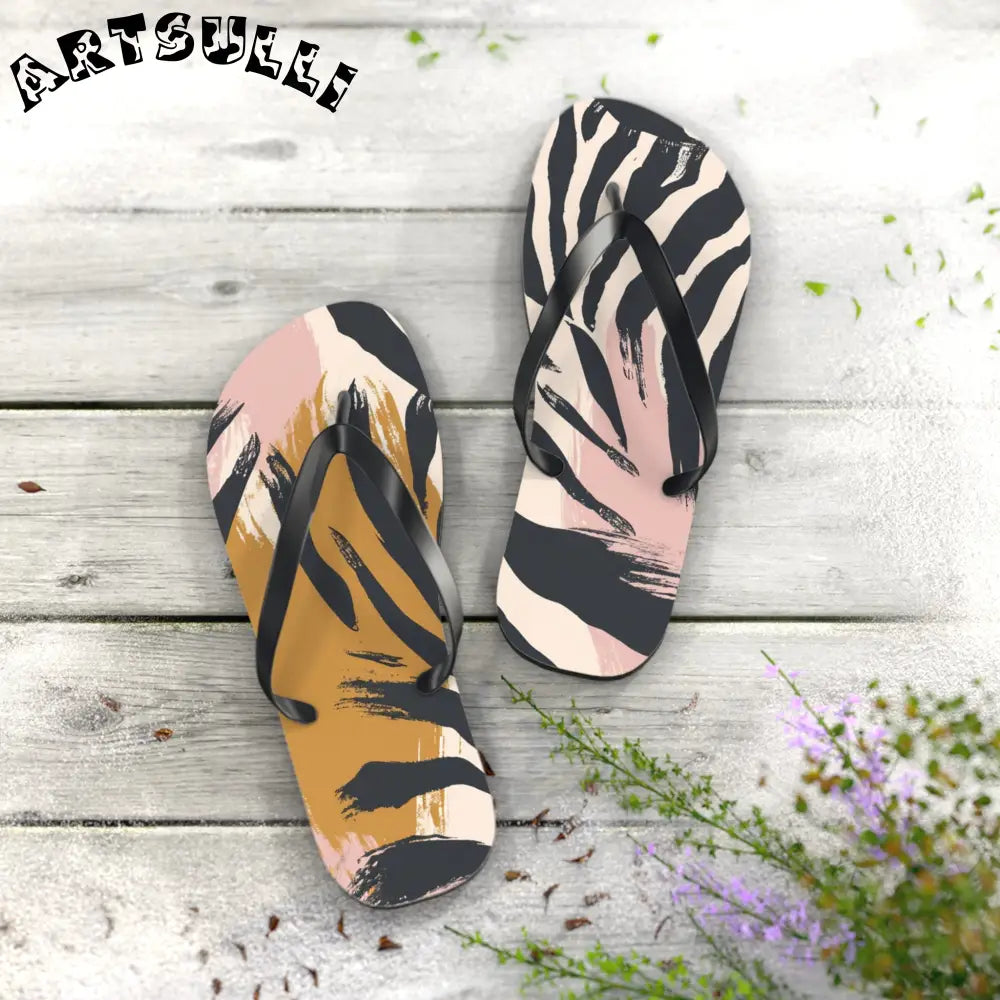JAKKOUTTHEBXX Abstract zebra print flip flops in two color palettes