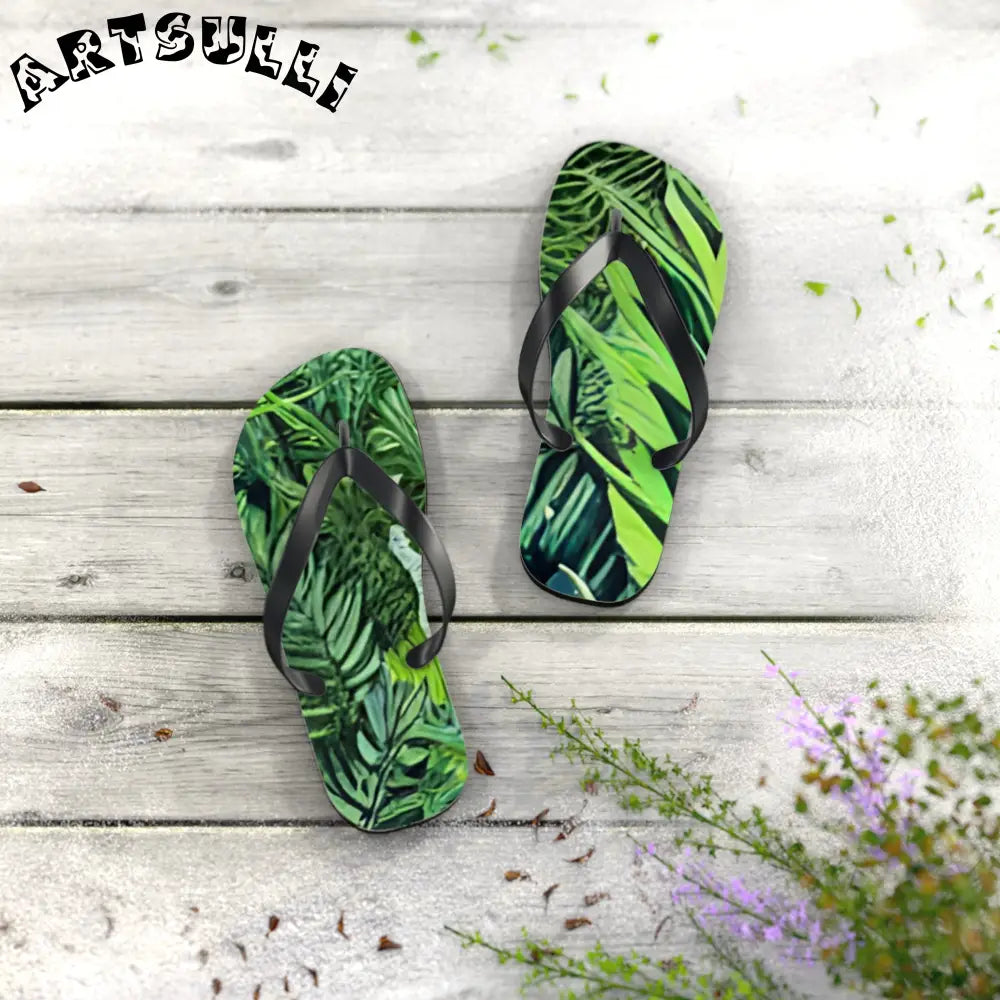 JAKKOUTTHEBXX Black Strapped Flip Flops with Green Leaf Pattern