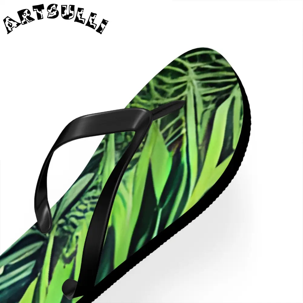 JAKKOUTTHEBXX Black Strapped Flip Flops with Green Leaf Pattern