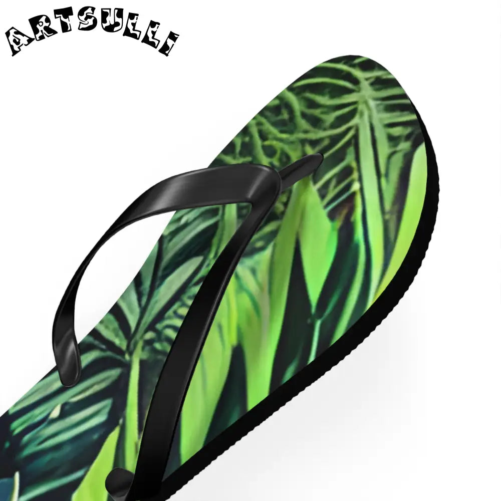 JAKKOUTTHEBXX Black Strapped Flip Flops with Green Leaf Pattern