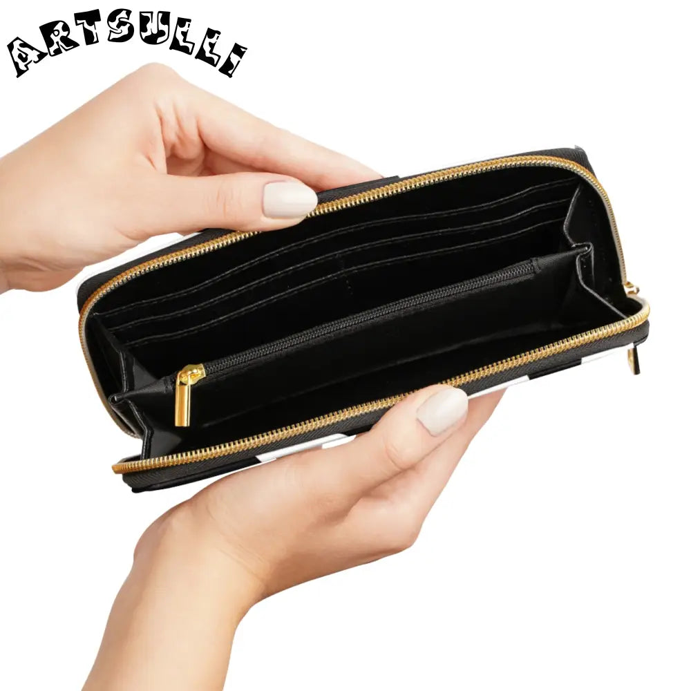 JAKKOUTTHEBXX Cow print zippered wallet displays credit cards with gold hardware 2025
