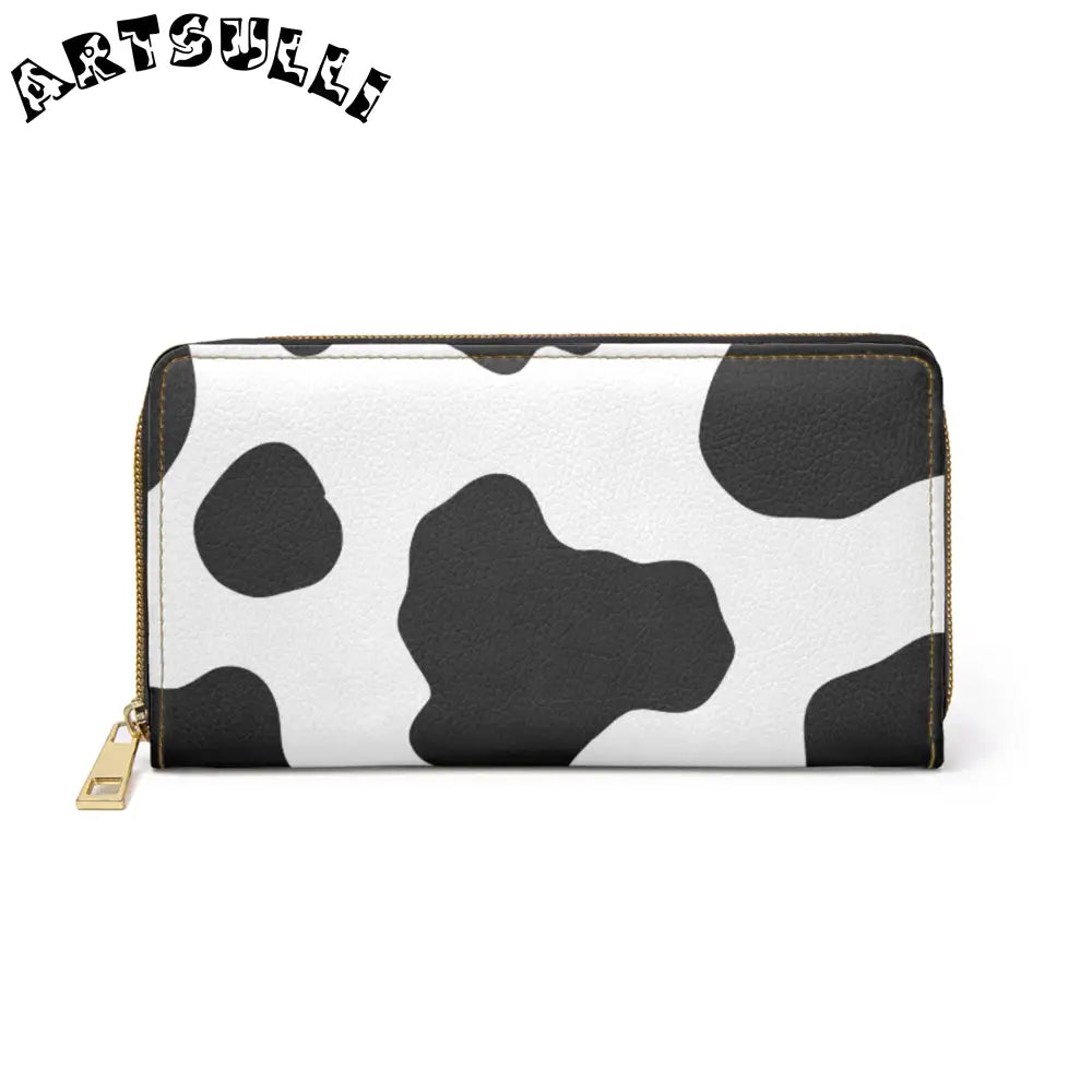 JAKKOUTTHEBXX Cow print zippered wallet displays credit cards with gold hardware 2025