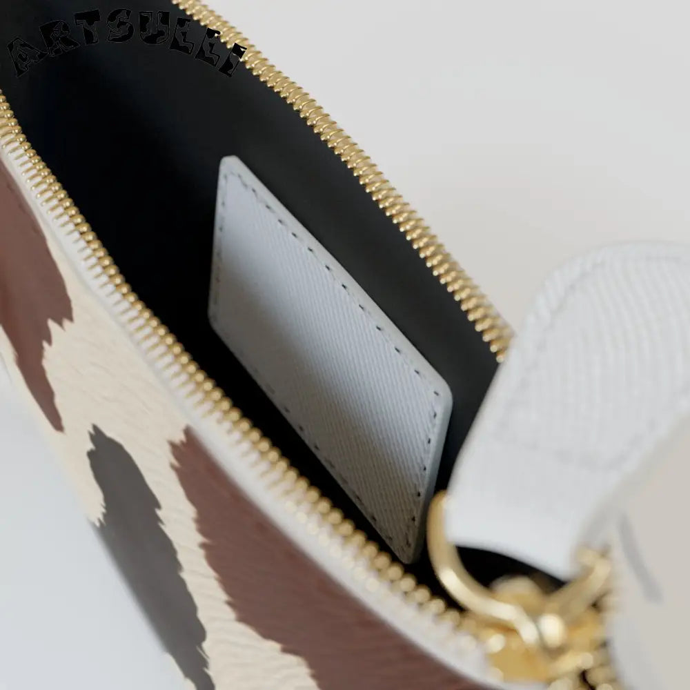 JAKKOUTTHEBXX Chic Cow Print Clutch Bag 2025
